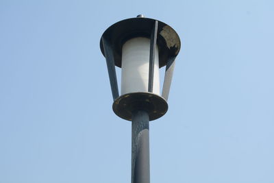 Low angle view of street light against sky