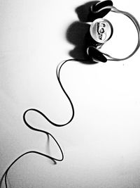 Close up of white object over white background