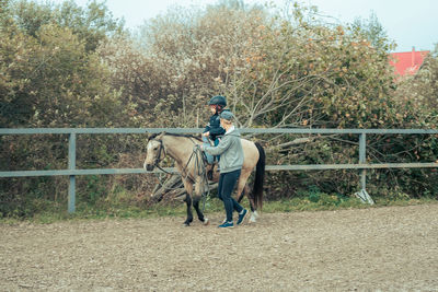 This is a treatment called hippotherapy, life in the education age of disabled children