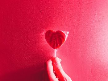 Close-up of woman hand holding heart shape