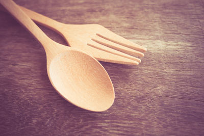 High angle view of fork and spoon on table