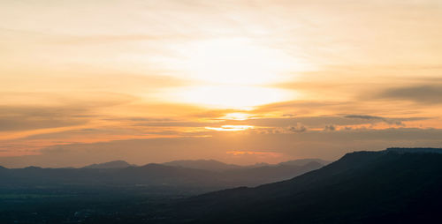 Scenic view of mountains against sky during sunset