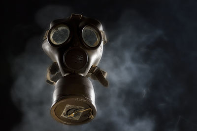 High angle view of gas mask on table