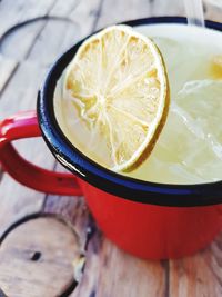 High angle view of lemon in glass on table