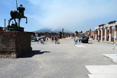 Statue of people in town square