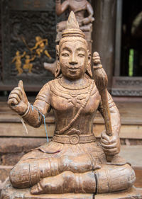 Close-up of statue against temple