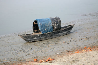 High angle view of abandoned boat on beach