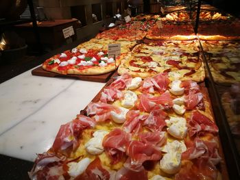 Close-up of pizza on table in restaurant