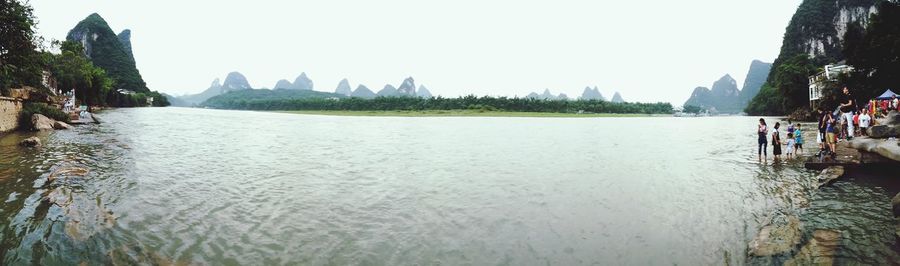 Panoramic view of sea against clear sky