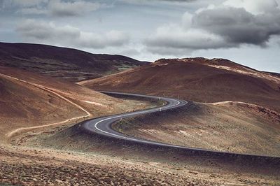 Landscape with mountain range in background