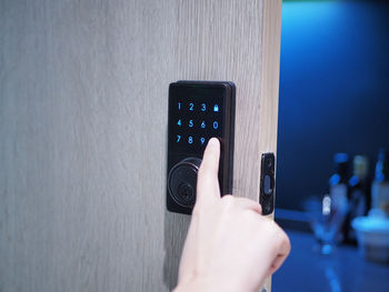 Close-up of hand holding mobile phone