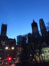 Low angle view of buildings against clear sky