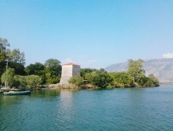 View of built structures against clear sky