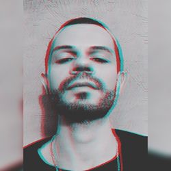 Portrait of young man with eyes closed