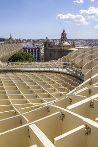 Buildings in city against sky