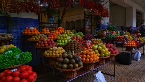 Tropical fruits for sale at market stall in the farmer's market in madeira