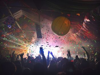 People enjoying music concert