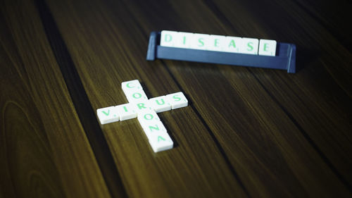 Close-up of information sign on table