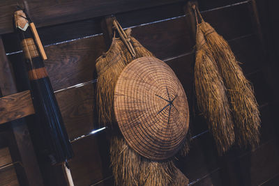 High angle view of paintbrushes hanging on wood