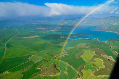 Aerial view of rainbow over landscape