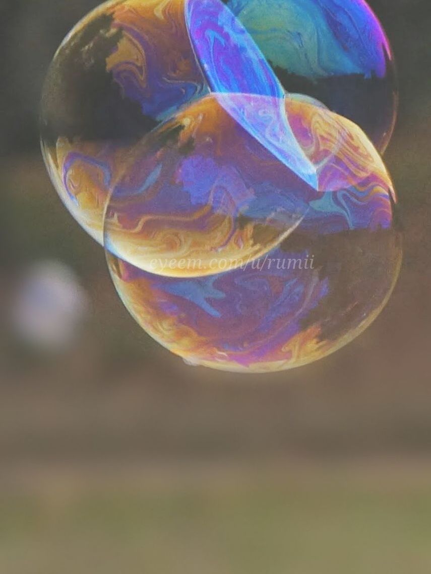 transparent, glass - material, close-up, bubble, sphere, indoors, blue, multi colored, focus on foreground, reflection, no people, mid-air, glass, drinking glass, still life, food and drink, refreshment, water, day