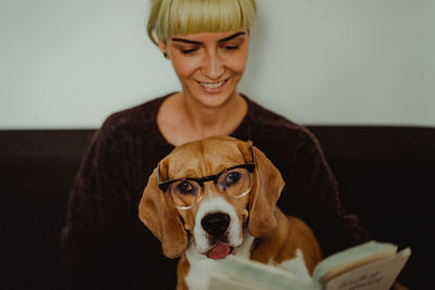 Portrait of woman with dog