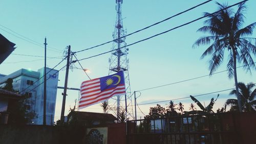 Low angle view of flag against sky