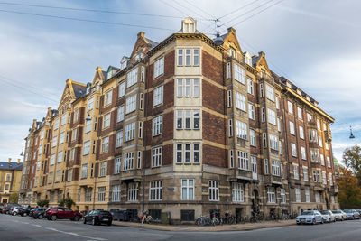 Low angle view of vintage building against sky