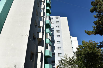 Perspective view of flat of blocks from communist period, worn out concrete buildings eastern europe