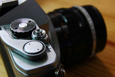 Close-up of camera on table