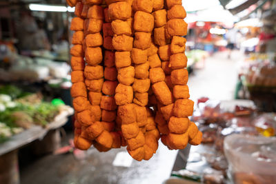 Close-up of orange fruits for sale in market