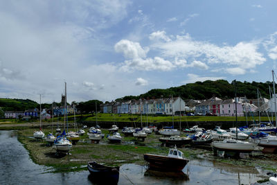 Boats moored at harbor