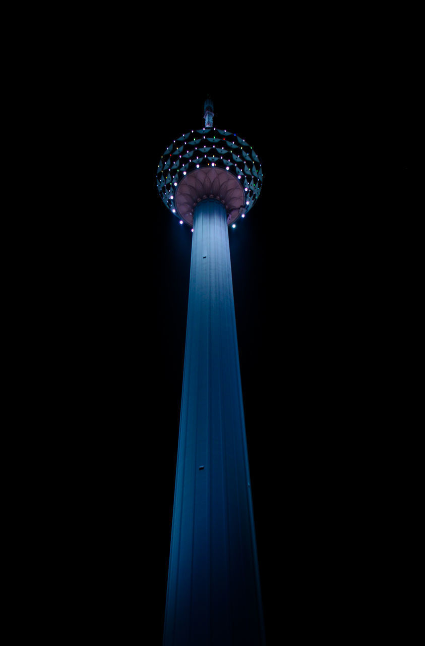 LOW ANGLE VIEW OF ILLUMINATED TOWER AGAINST BLUE SKY