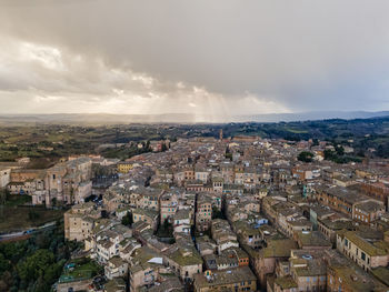 High angle shot of townscape against sky