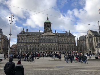 Group of people in front of historical building