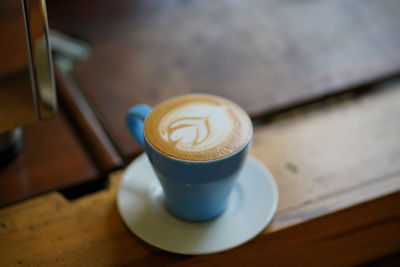 Coffee cup on table