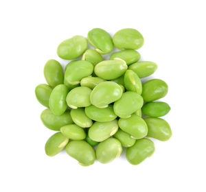 High angle view of green beans against white background