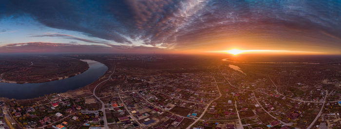 High angle view of city against sky during sunset