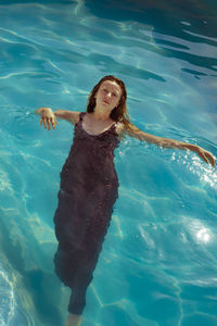 Woman swimming in pool