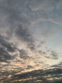 Low angle view of clouds in sky during sunset