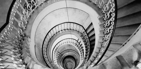 Directly below shot of spiral staircase in building