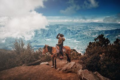 Man riding horse