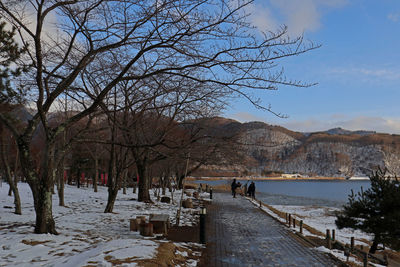 Scenic view of snow covered mountains against sky