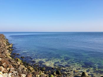 Scenic view of sea against clear sky