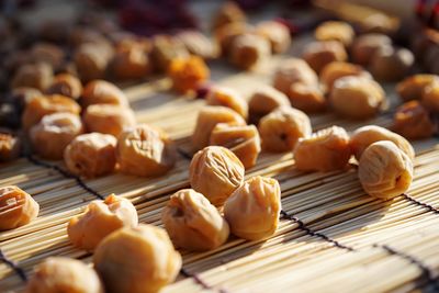 Close-up of dry apricots on mat