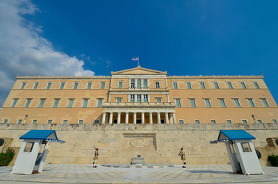 Low angle view of built structure against blue sky