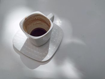 High angle view of coffee cup on table