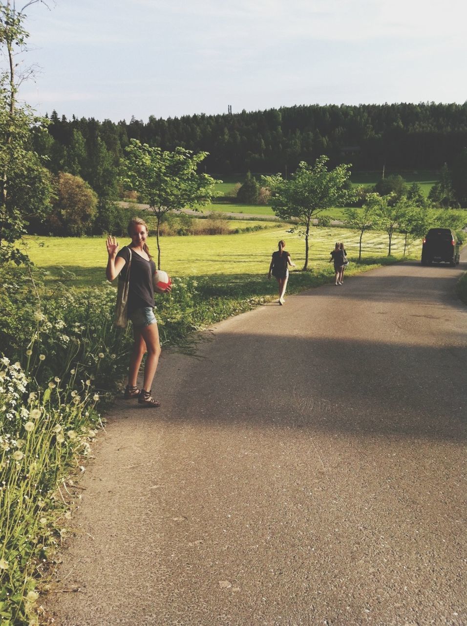 lifestyles, full length, leisure activity, tree, grass, rear view, field, casual clothing, landscape, sky, men, tranquility, walking, nature, tranquil scene, childhood, the way forward