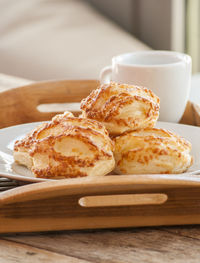 Close-up of baked breads in plate