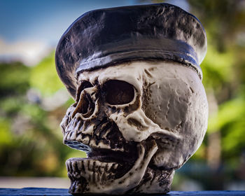 Close-up of human skull on table